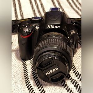 Nikon DSLR D5100 barely used, all pieces included! Shuttercount is 3178!